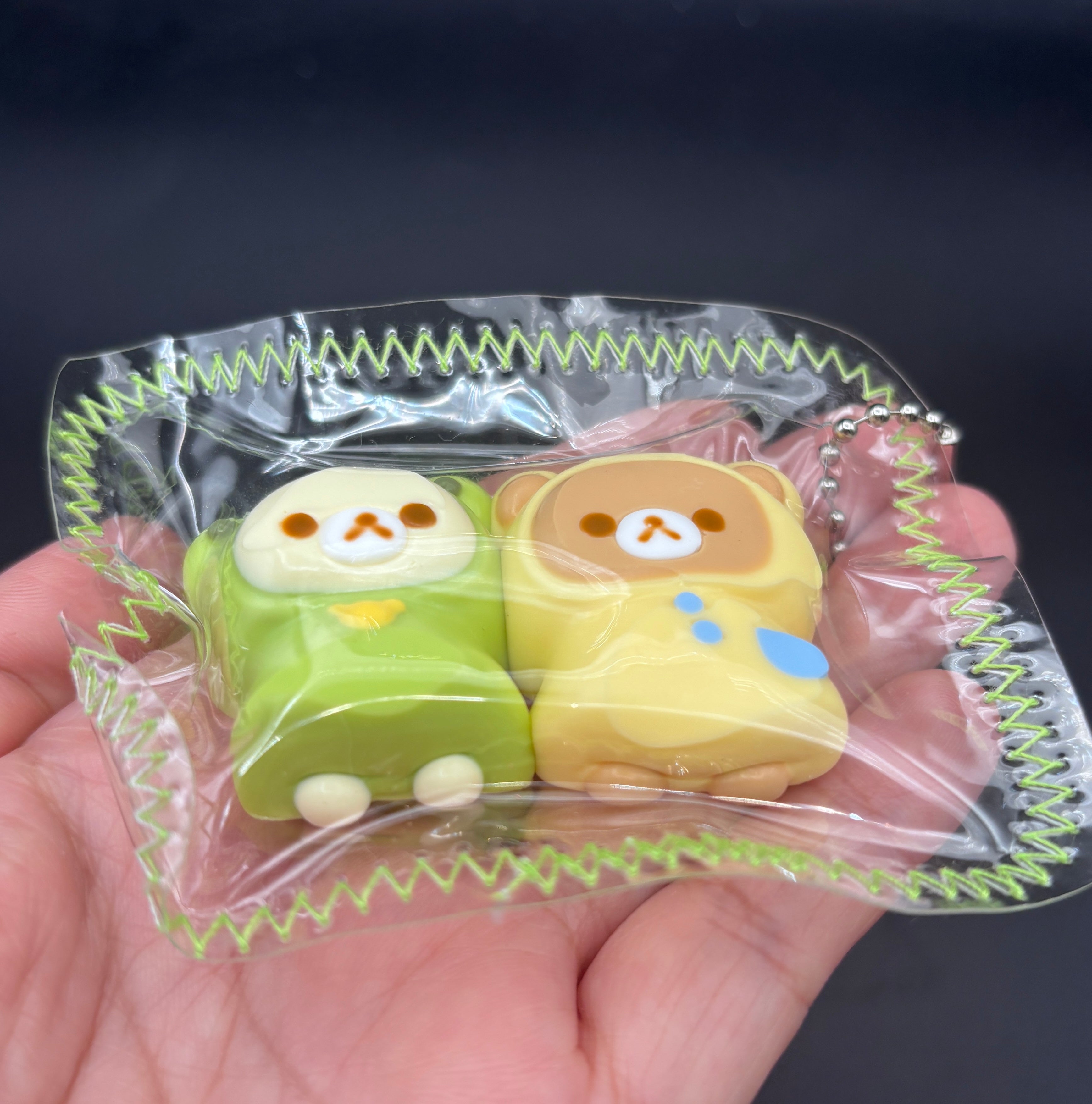 Frog Rilakkuma and Korilakkuma laying down mini Taba keychain