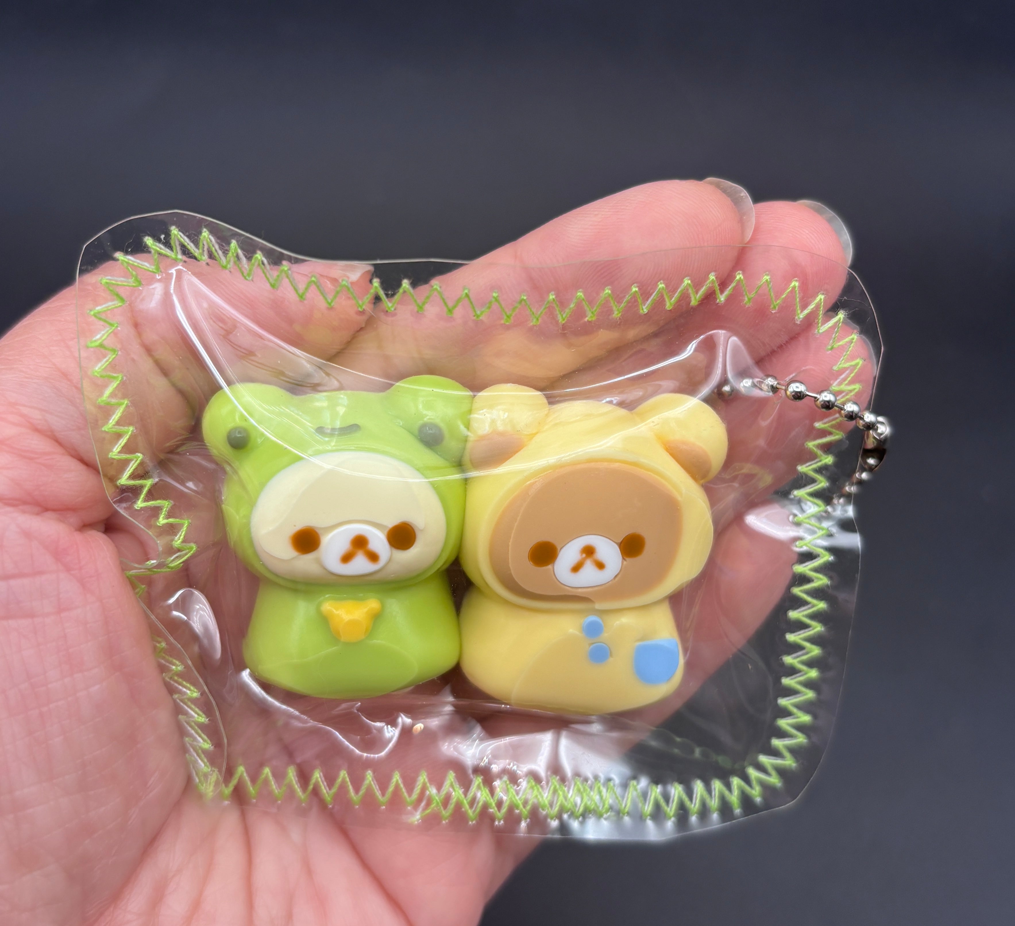 Frog Rilakkuma and Korilakkuma laying down mini Taba keychain
