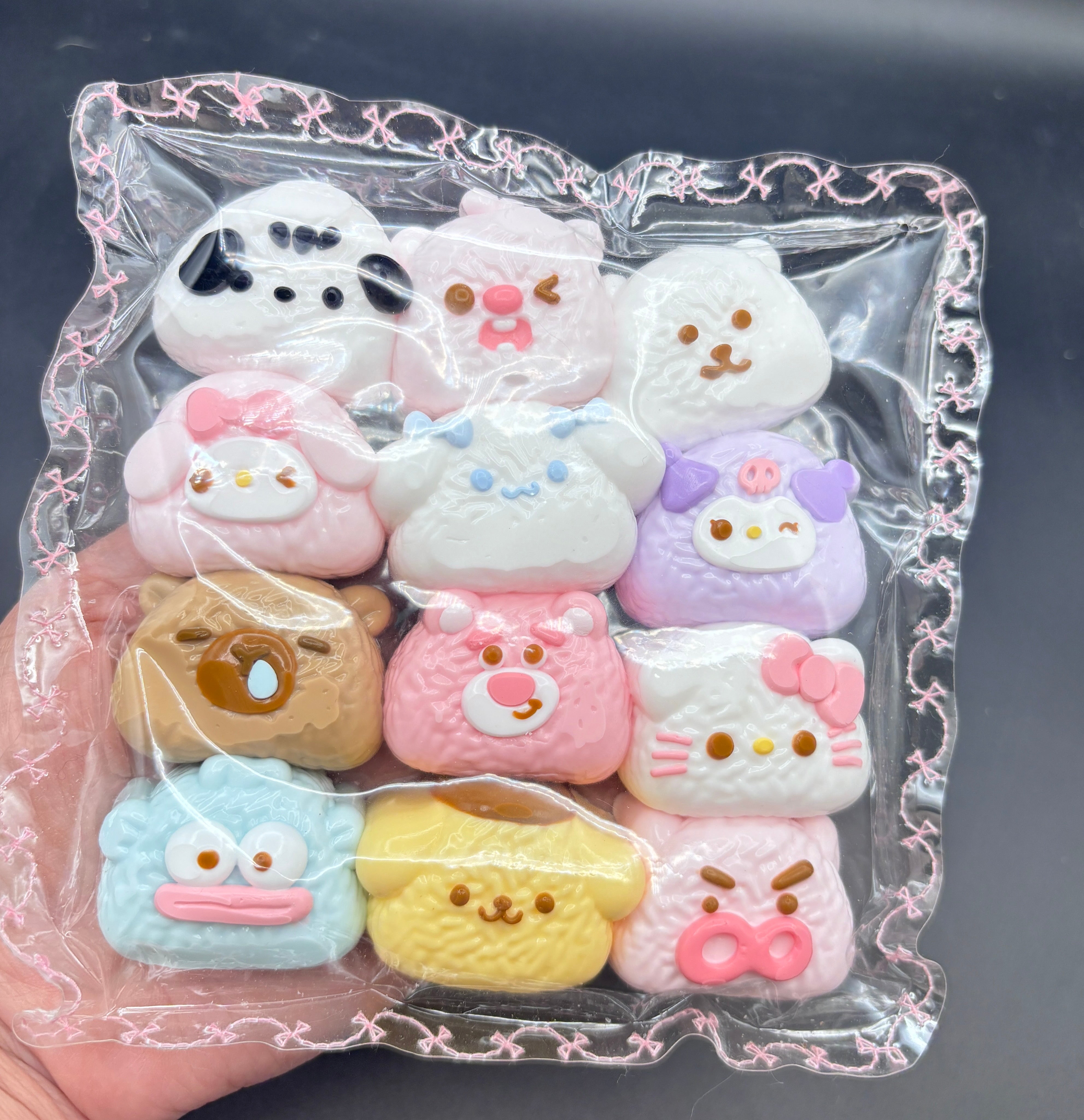 large pack of 12 small cartoon Taba Squishy Toy