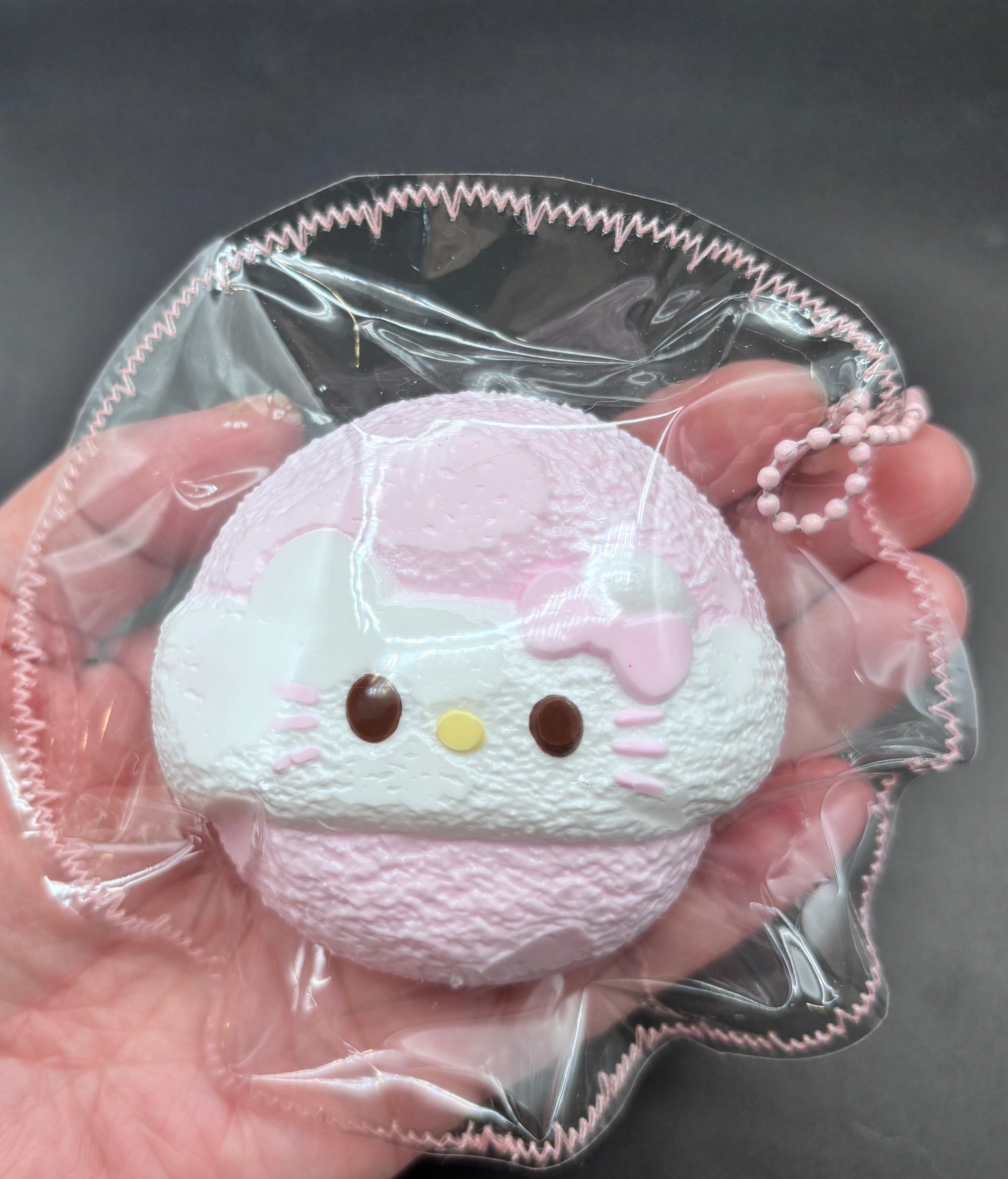 Median Pink Powder Puff Taba Squishy Toy