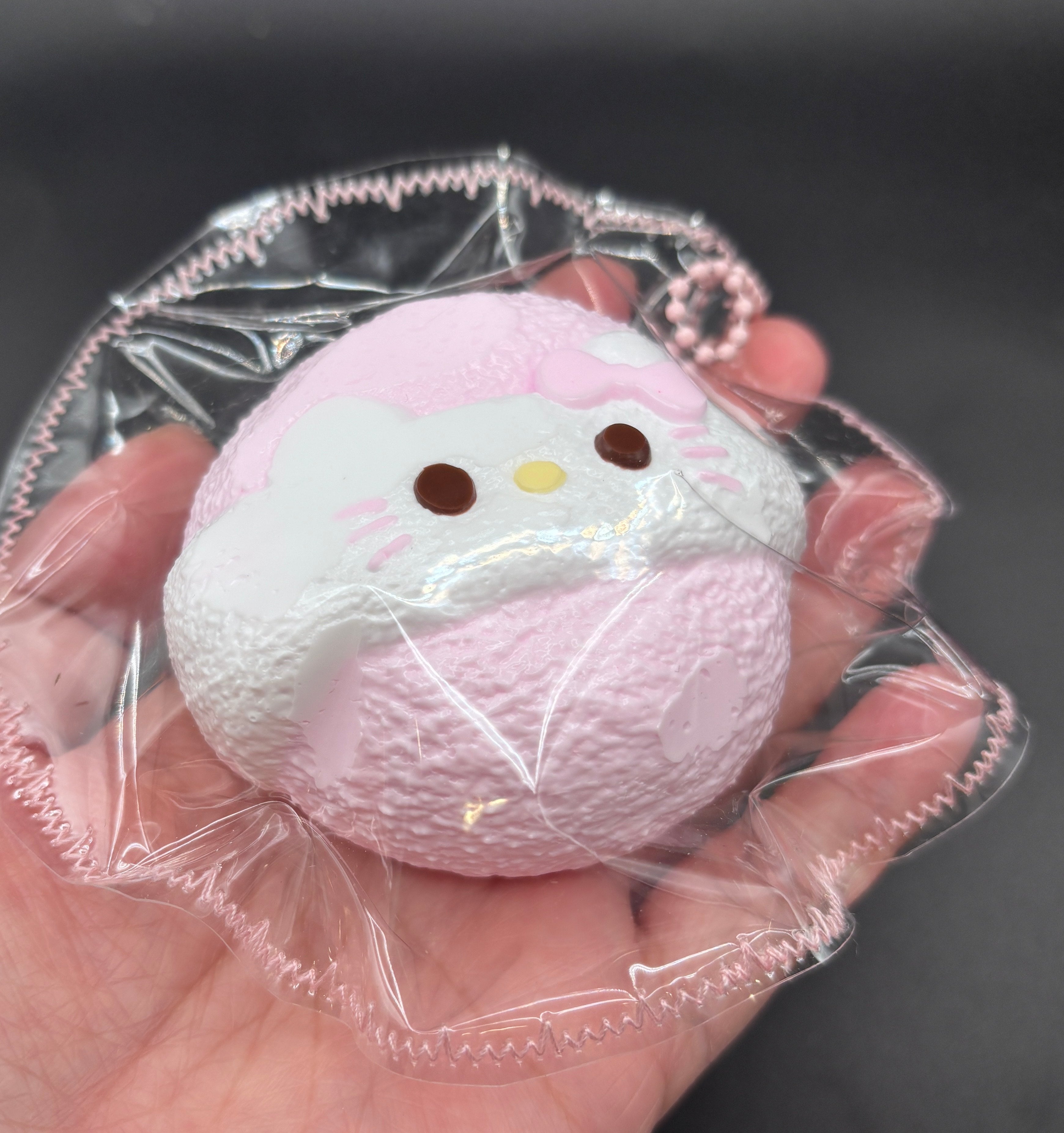 Median Pink Powder Puff Taba Squishy Toy