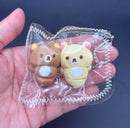 Rilakkuma and Korilakkuma laying down mini Taba keychain
