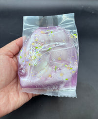 lavender pond (crunchy slime bag with wax pieces and clay)