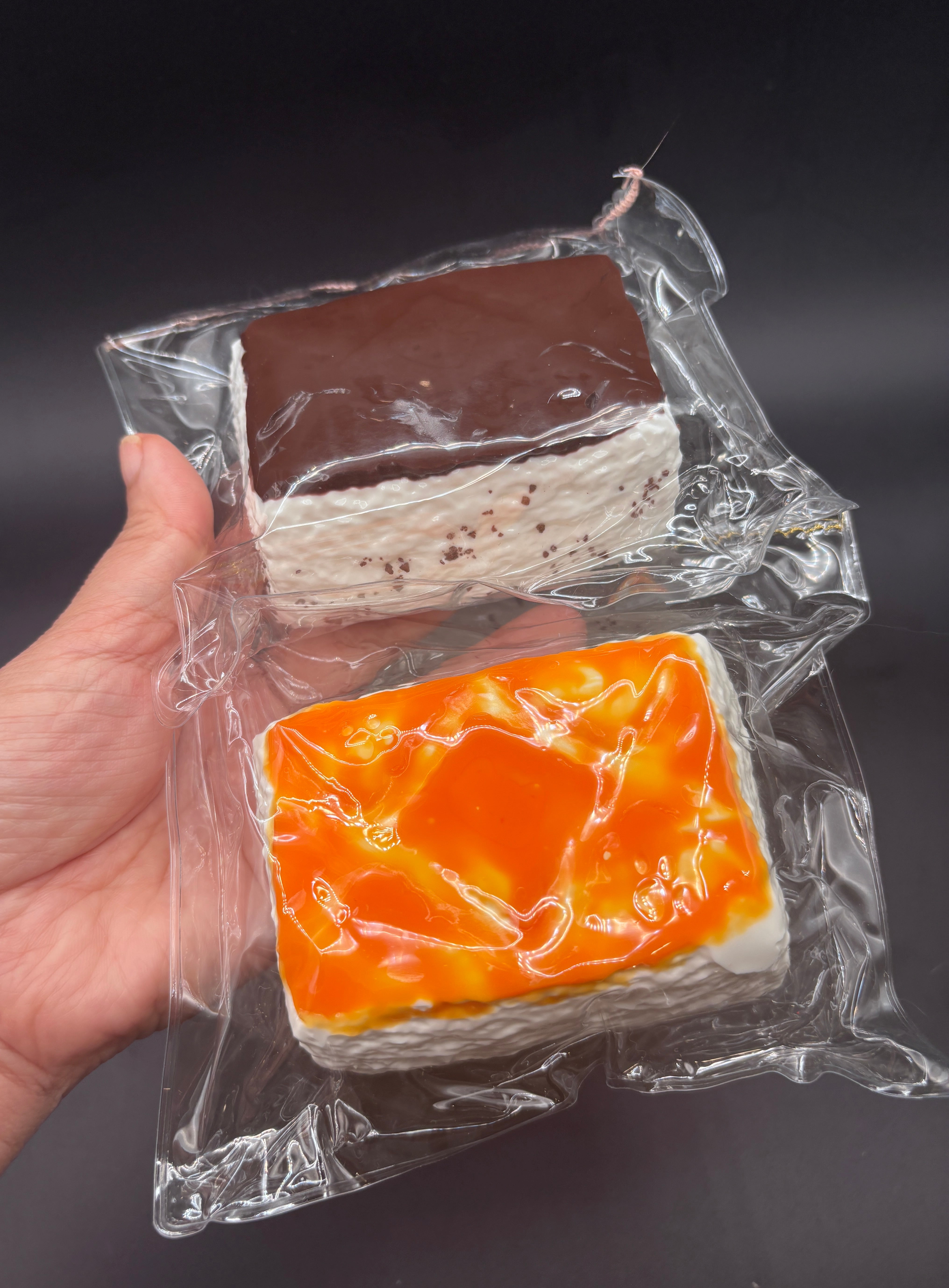Sponge cake soft (normal/choco) with imprinted cat paw on the top corner  Taba squishy toy