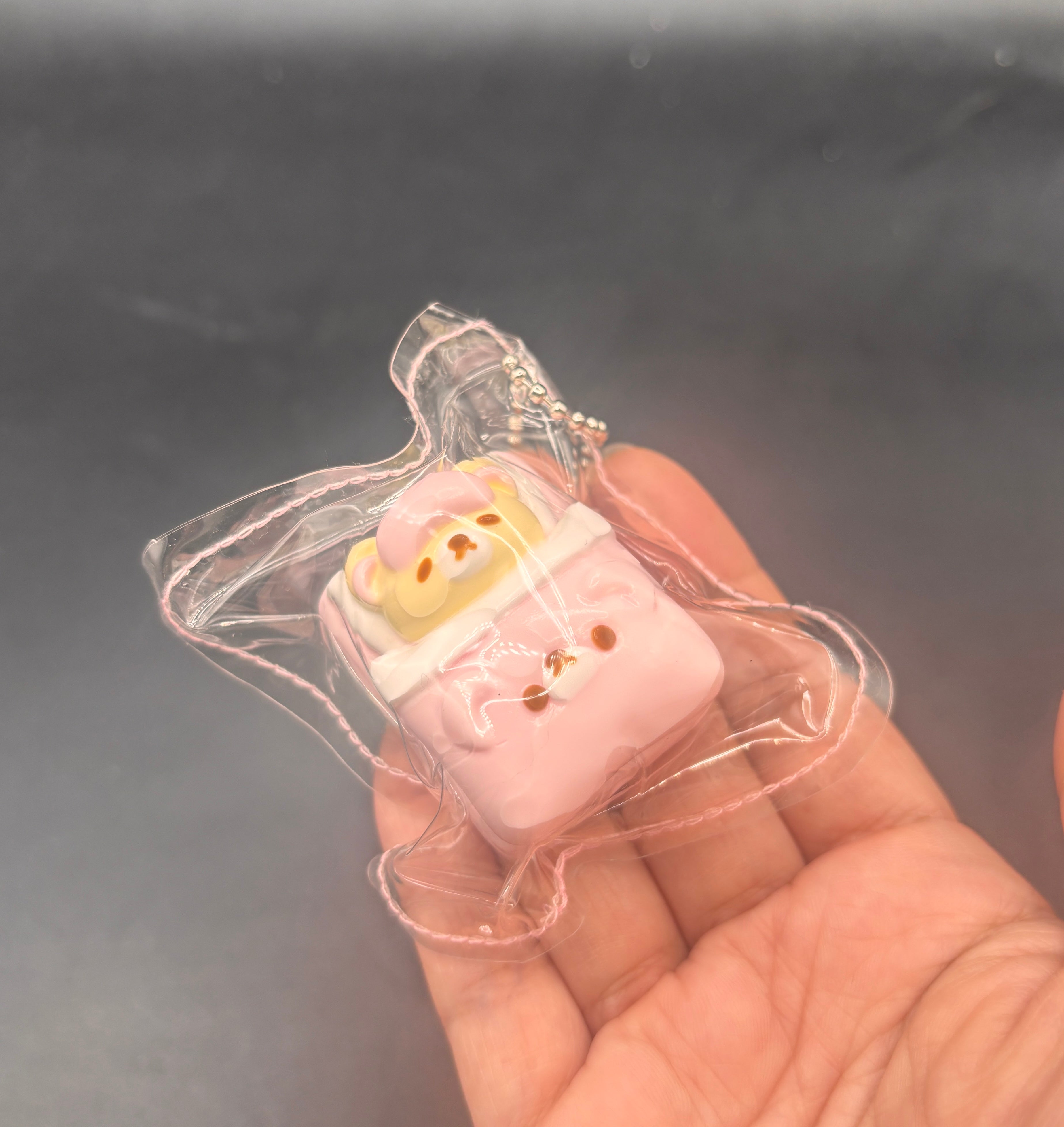 Cute mini Korilakkuma bed keychain taba squishy