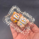Mini penguin twins in a rila hoodie tab keychain taba squishy