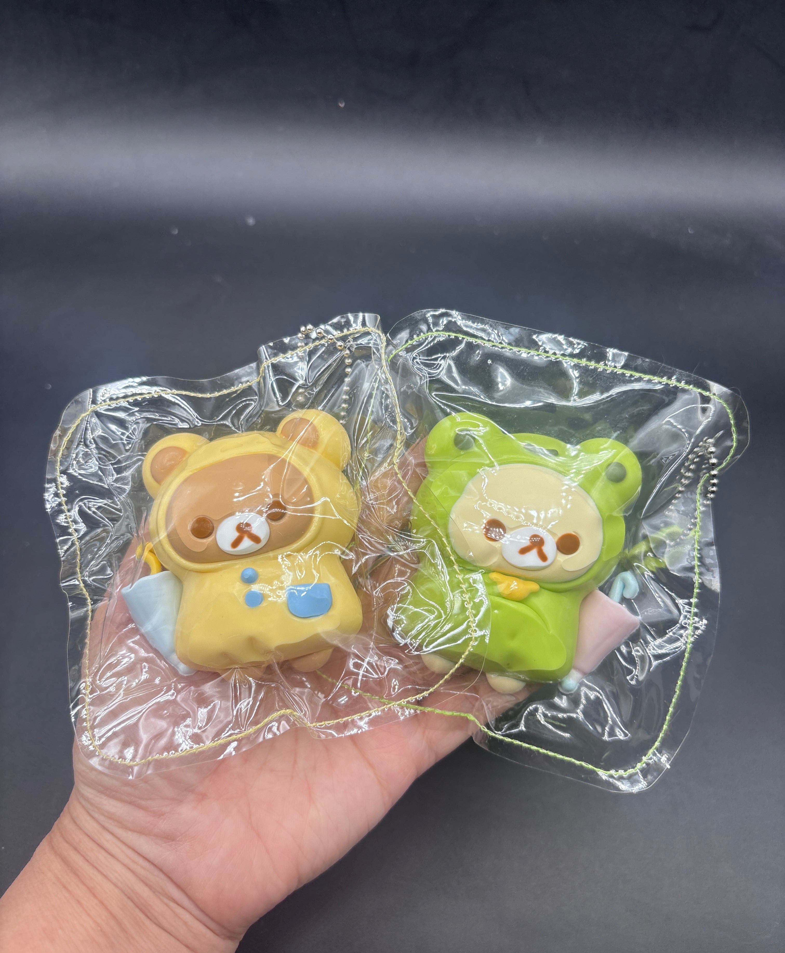 Super cute Rilakkuma and korilakkuma raincoat frog taba squishy
