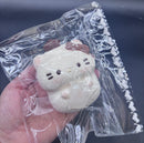 Frozen butter cute kitty holding a pillow  taba squishy
