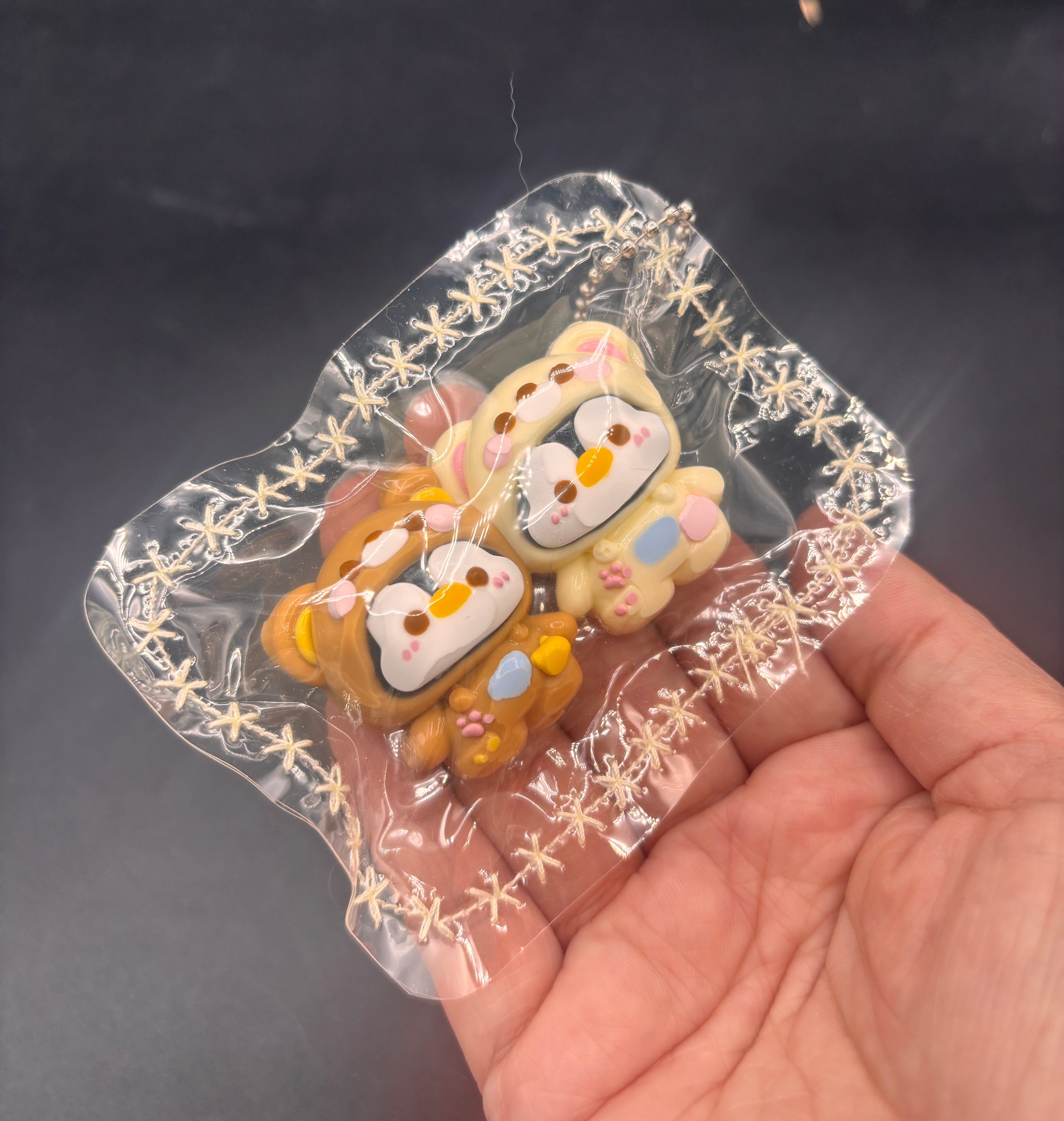 Mini penguin twins in a rila hoodie tab keychain taba squishy