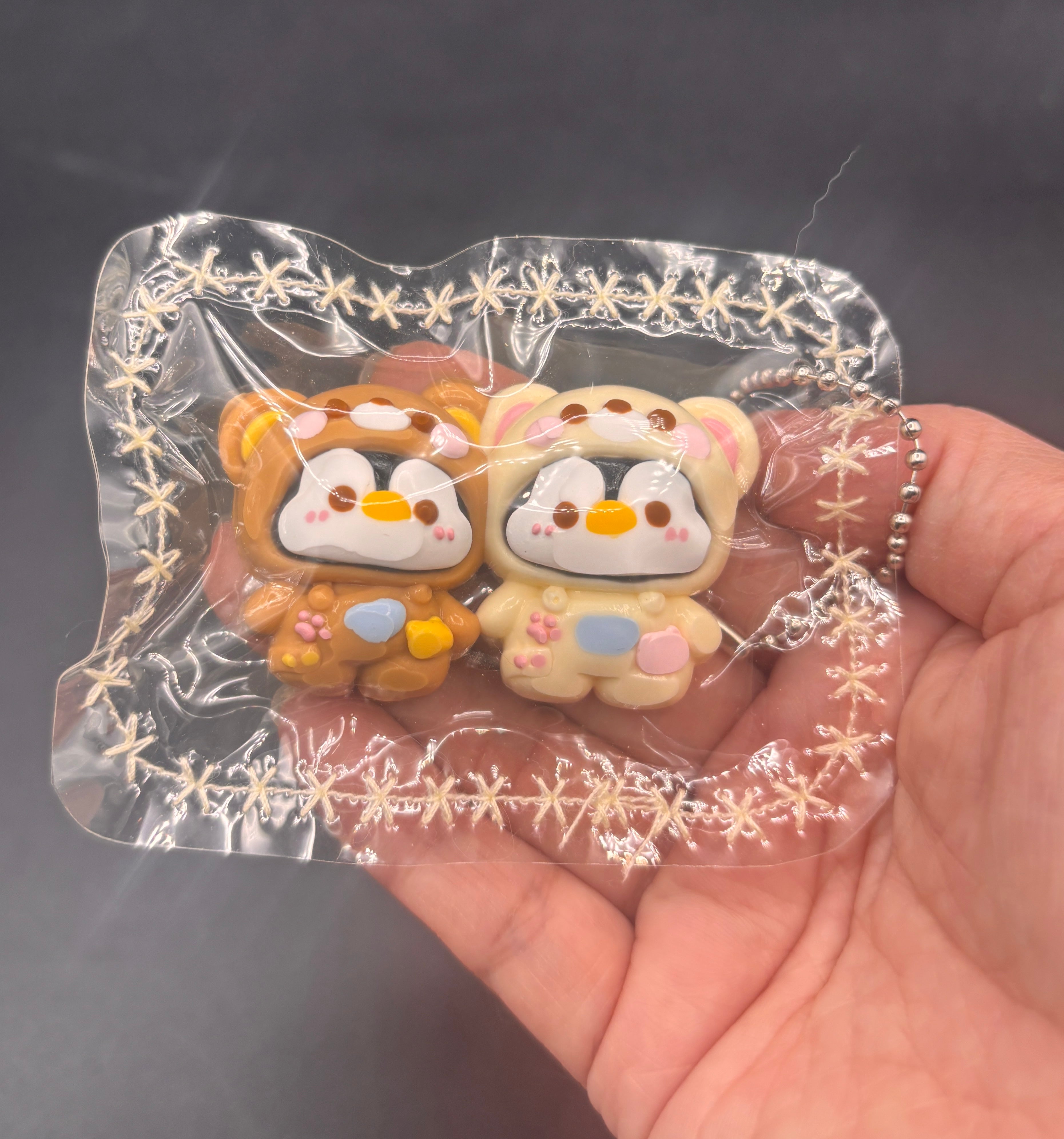 Mini penguin twins in a rila hoodie tab keychain taba squishy