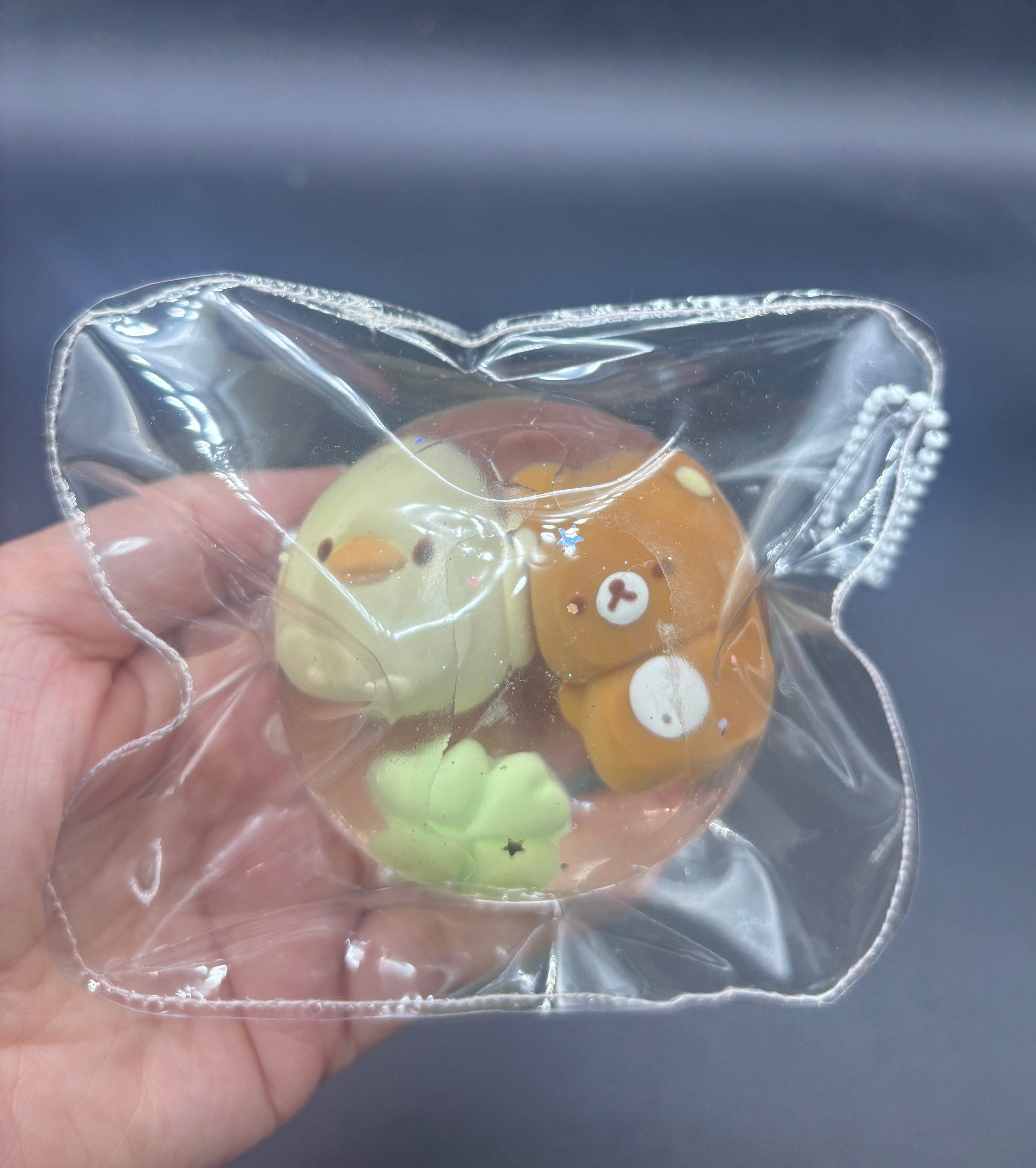 New cute Rilakkuma in a clear taba squishy ball