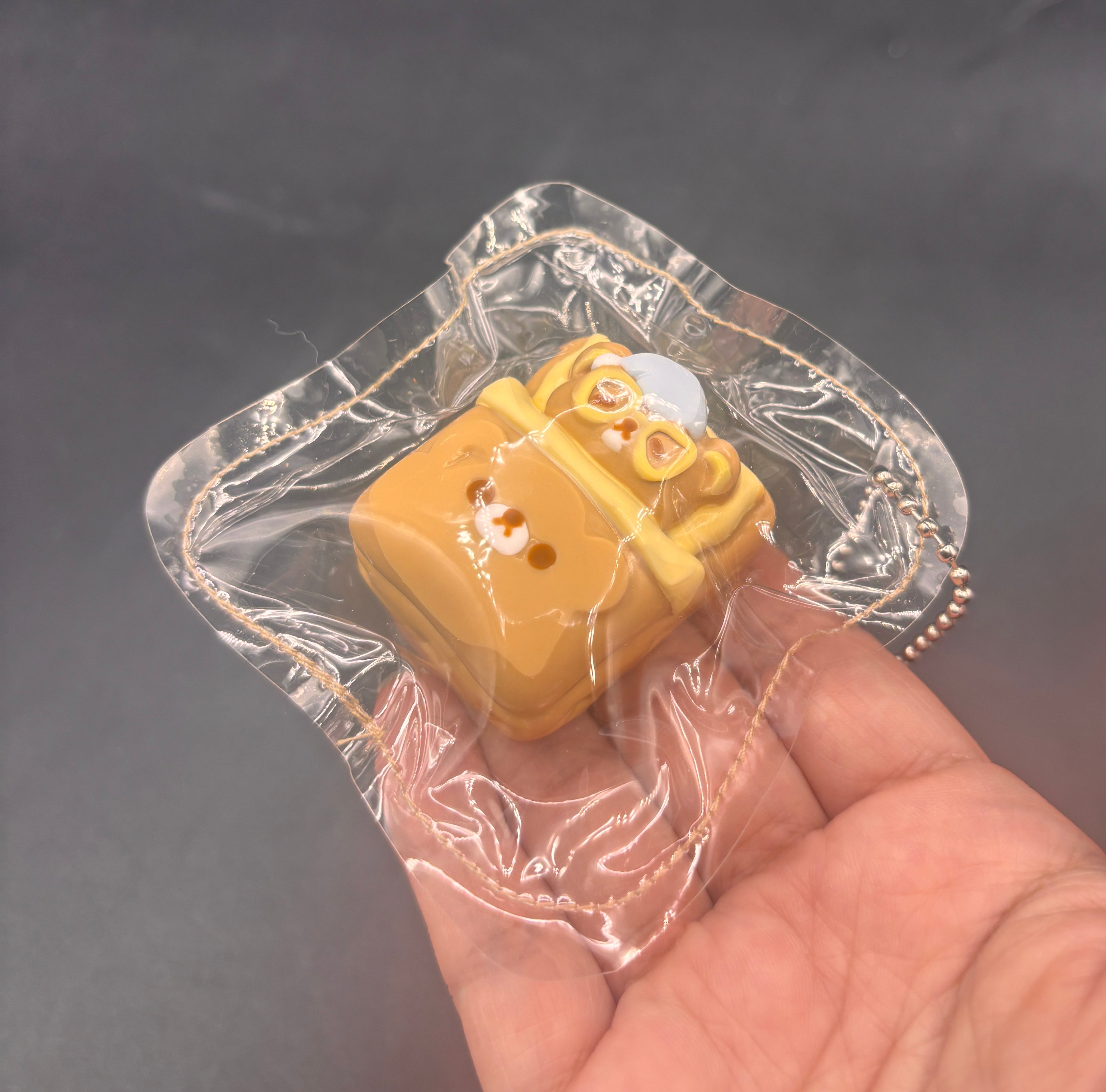 Cute mini rilakkuma bed keychain taba squishy