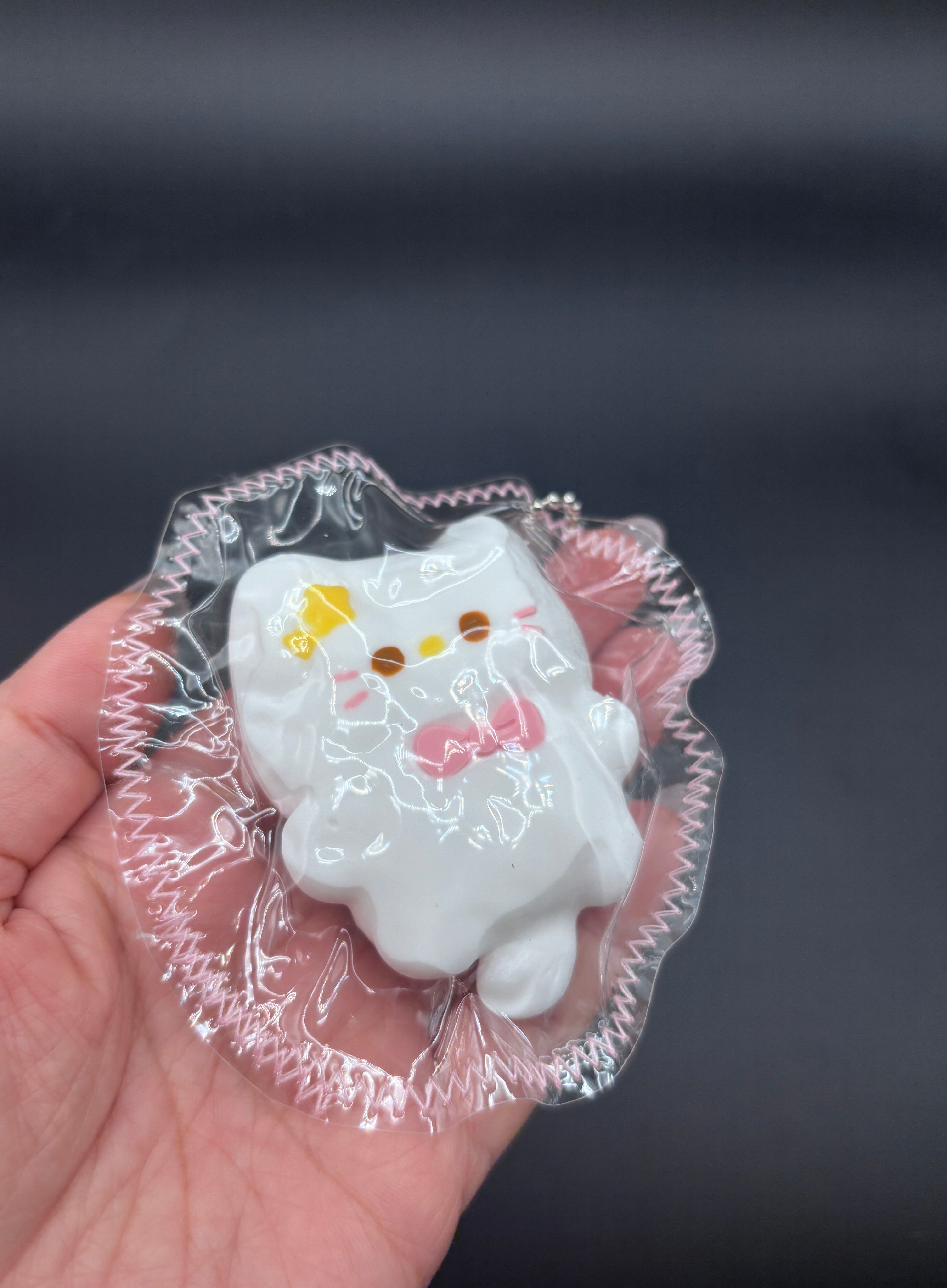 Cute mini keychain kitty laying down soft taba squishy