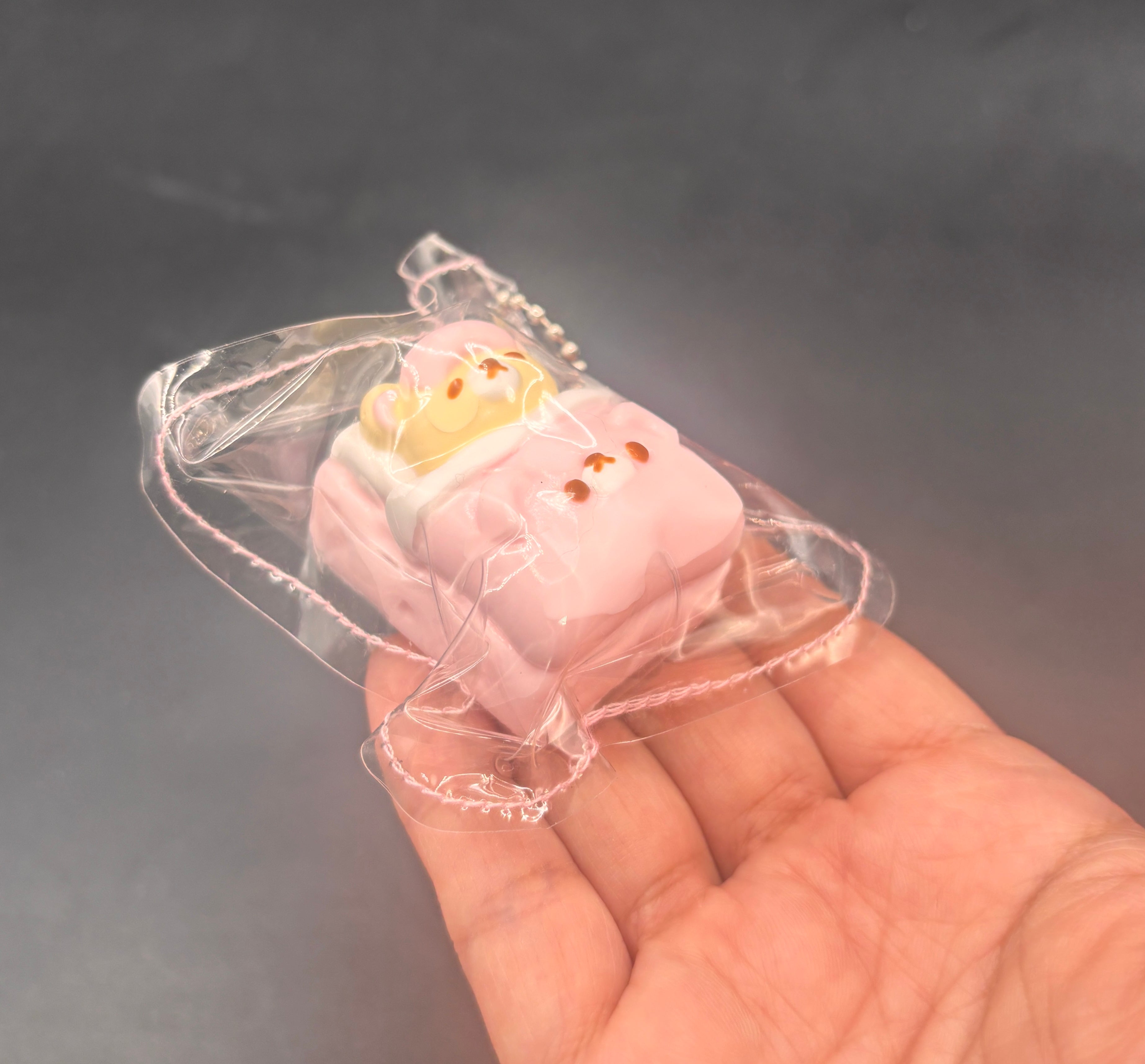Cute mini Korilakkuma bed keychain taba squishy
